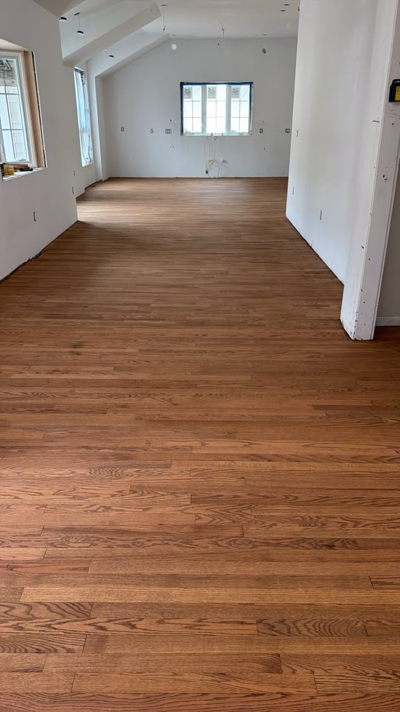 Wood flooring in a bright room during renovation