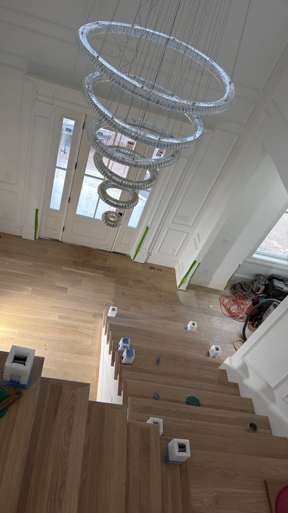 Wood stair treads and entrance flooring viewed from above